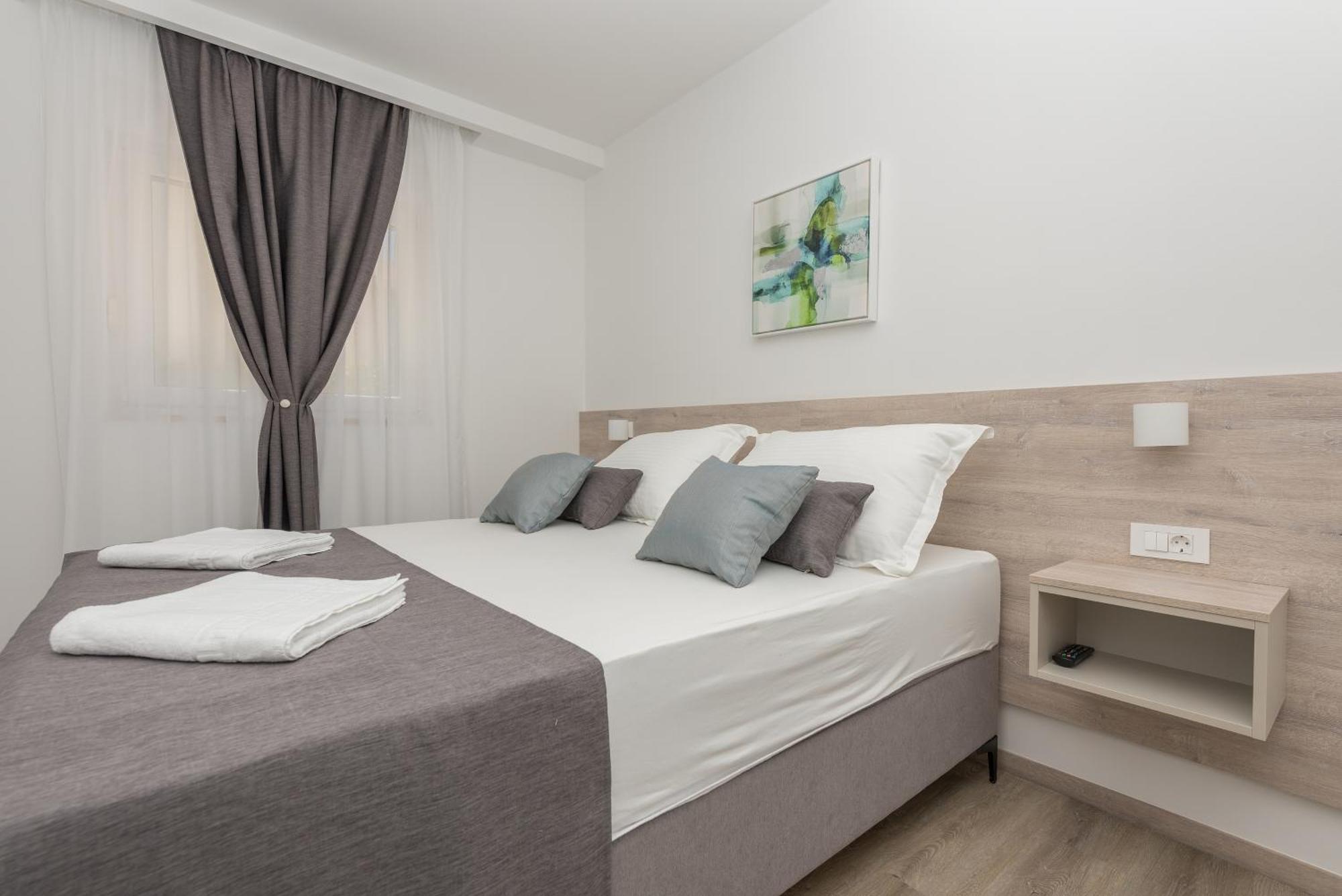 Apartments By The Sea Makarska - 19134 Номер фото